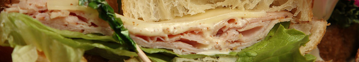 Eating Deli Sandwich at Lotito's Deli & Bakery restaurant in Ramsey, NJ.